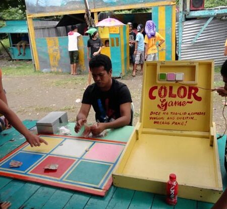 The Fascinating History of the Color Game: From Street Fairs to Online Platforms